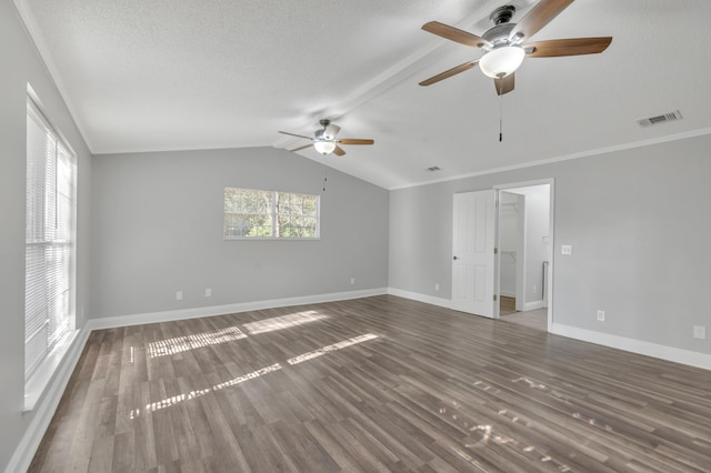 319 Jones Rd, Crestview, FL 32536 - spare room with ceiling fan, wood finished floors, baseboards, vaulted ceiling, and a textured ceiling