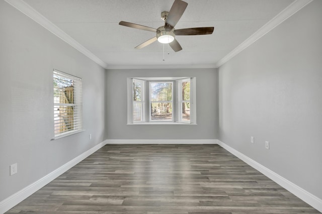 319 Jones Rd, Crestview, FL 32536 - empty room with ornamental molding, ceiling fan, baseboards, and wood finished floors
