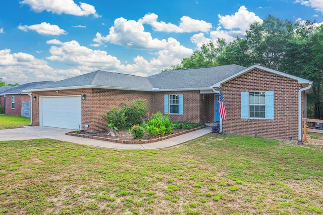 41 S Hidden Lakes Trl, Defuniak Springs, FL 32433 - ranch-style house featuring brick siding, an attached garage, concrete driveway, and a front yard
