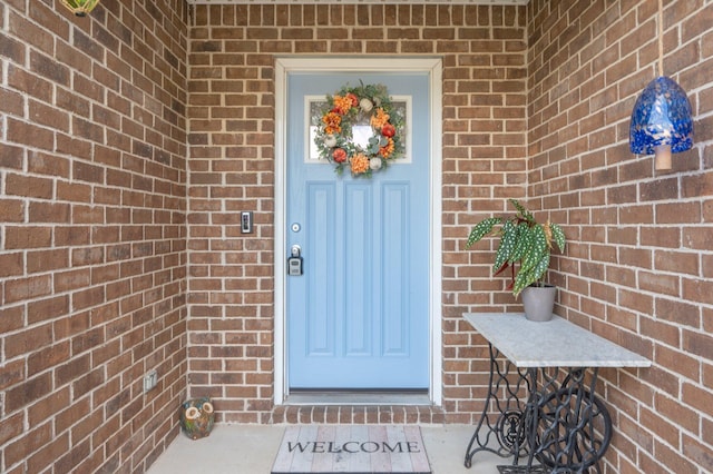 41 S Hidden Lakes Trl, Defuniak Springs, FL 32433 - doorway to property featuring brick siding