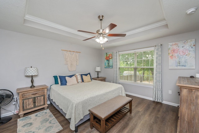 41 S Hidden Lakes Trl, Defuniak Springs, FL 32433 - bedroom featuring a raised ceiling, ornamental molding, dark wood finished floors, and baseboards