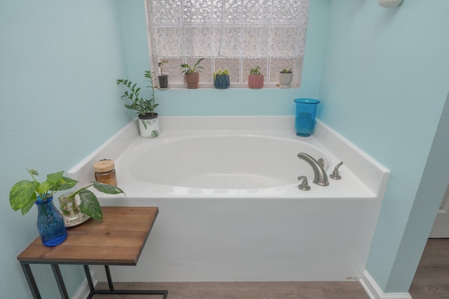 41 S Hidden Lakes Trl, Defuniak Springs, FL 32433 - bathroom featuring a garden tub