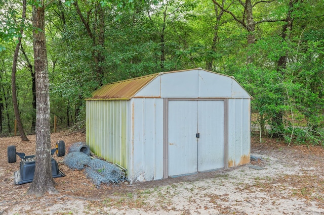 41 S Hidden Lakes Trl, Defuniak Springs, FL 32433 - view of shed with a view of trees