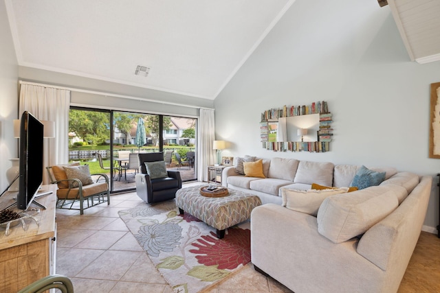 5144 Beachwalk Cir, Miramar Beach, FL 32550 - living room featuring high vaulted ceiling, light tile patterned flooring, and crown molding