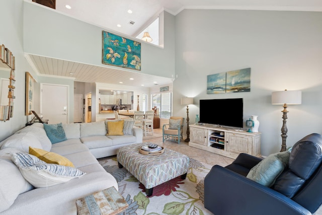 5144 Beachwalk Cir, Miramar Beach, FL 32550 - living area featuring high vaulted ceiling, crown molding, and recessed lighting