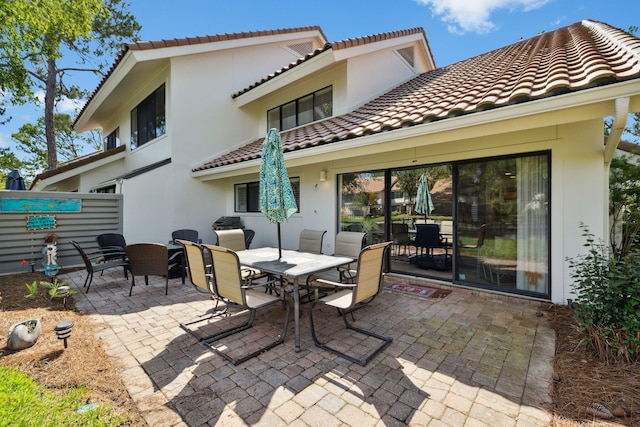 5144 Beachwalk Cir, Miramar Beach, FL 32550 - view of patio with outdoor dining area