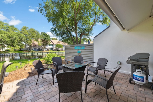 5144 Beachwalk Cir, Miramar Beach, FL 32550 - view of patio featuring a water view