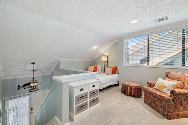 5144 Beachwalk Cir, Miramar Beach, FL 32550 - bedroom featuring vaulted ceiling, light colored carpet, a textured ceiling, a chandelier, and crown molding