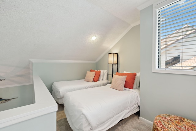 5144 Beachwalk Cir, Miramar Beach, FL 32550 - bedroom featuring carpet flooring, lofted ceiling, a textured ceiling, crown molding, and baseboards