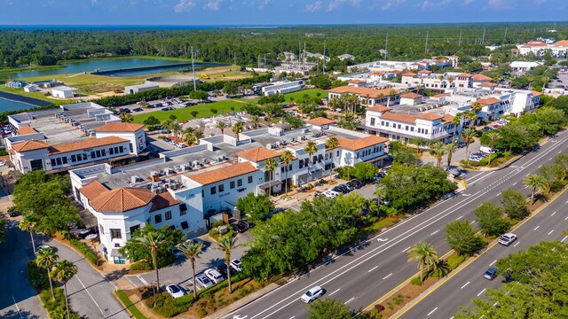 5144 Beachwalk Cir, Miramar Beach, FL 32550 - bird's eye view of a nearby body of water and a forest