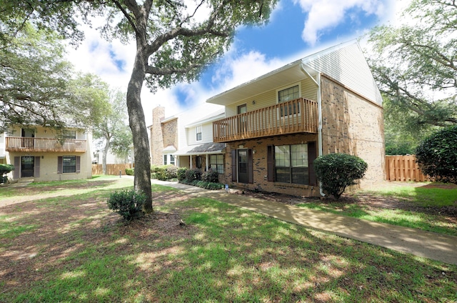 118 5th Ave Unit 118, Shalimar, FL 32579 - view of front of home featuring brick siding and a balcony