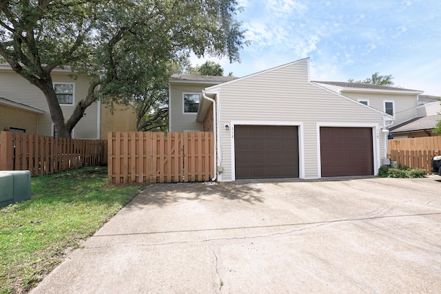 118 5th Ave Unit 118, Shalimar, FL 32579 - view of front of home featuring an attached garage and driveway