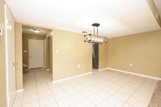 118 5th Ave Unit 118, Shalimar, FL 32579 - unfurnished room featuring baseboards and light tile patterned floors