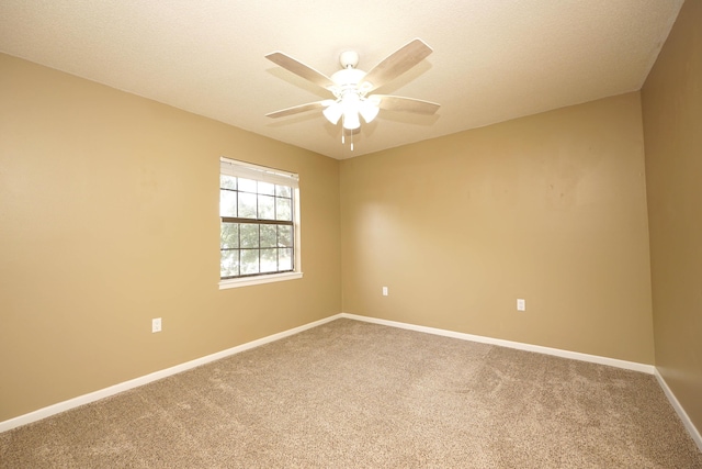 118 5th Ave Unit 118, Shalimar, FL 32579 - carpeted spare room featuring a ceiling fan and baseboards