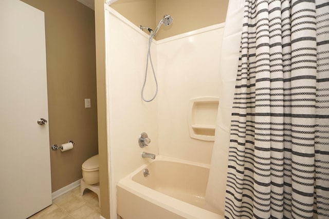 118 5th Ave Unit 118, Shalimar, FL 32579 - full bathroom featuring toilet, shower / tub combo with curtain, tile patterned flooring, and baseboards