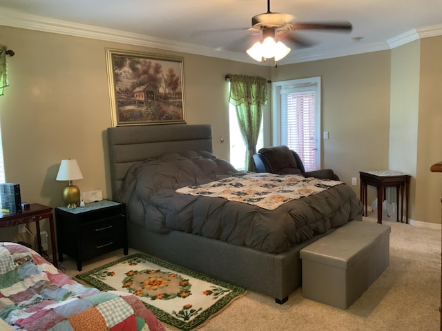 bedroom featuring ornamental molding, light carpet, and a ceiling fan