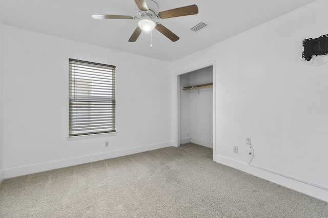 2512 Georgetown Ln, Fort Walton Beach, FL 32547 - unfurnished bedroom featuring carpet, baseboards, ceiling fan, and a closet