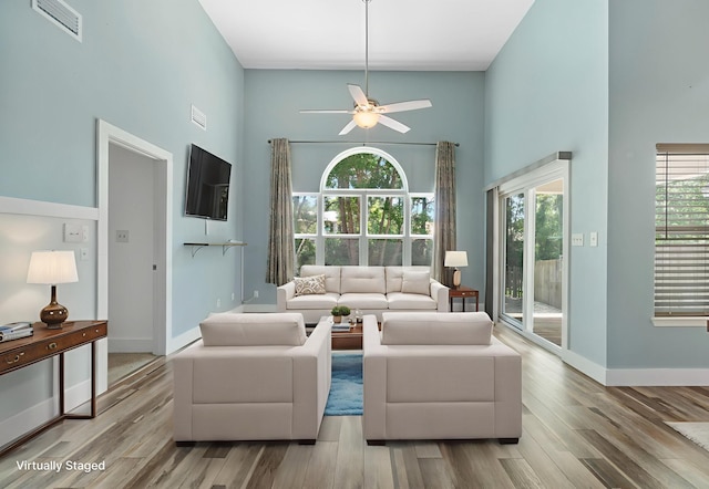 2512 Georgetown Ln, Fort Walton Beach, FL 32547 - living area with a high ceiling, ceiling fan, and wood finished floors