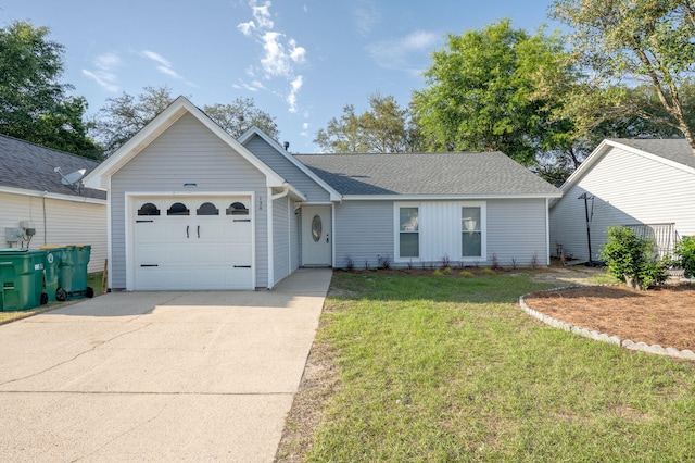136 Midland Ct, Niceville, FL 32578 - ranch-style home featuring concrete driveway, an attached garage, a front lawn, and roof with shingles