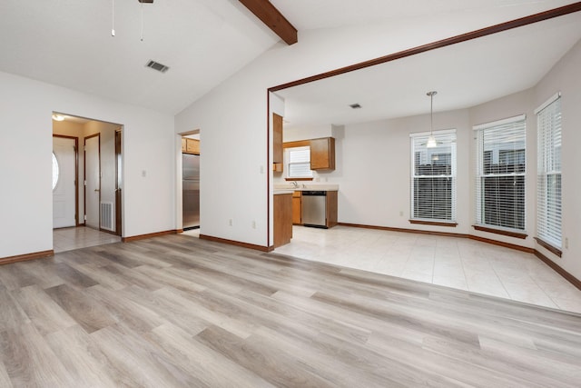 136 Midland Ct, Niceville, FL 32578 - unfurnished living room with healthy amount of natural light, light wood finished floors, baseboards, and a ceiling fan
