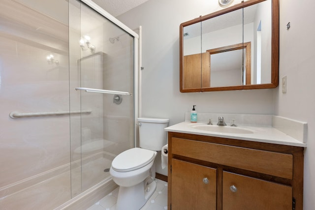 136 Midland Ct, Niceville, FL 32578 - full bathroom with a shower stall, toilet, vanity, and tile patterned floors