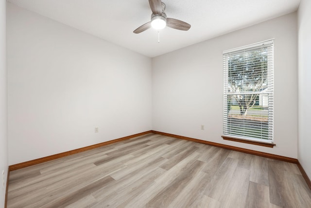 136 Midland Ct, Niceville, FL 32578 - unfurnished room featuring light wood-style flooring, baseboards, and ceiling fan