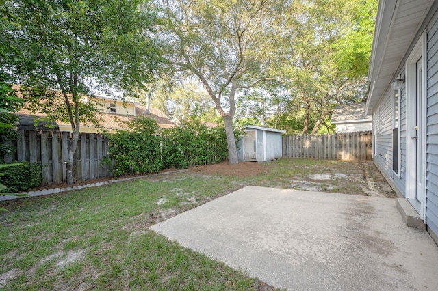 136 Midland Ct, Niceville, FL 32578 - fenced backyard featuring a patio area, a storage shed, and an outdoor structure