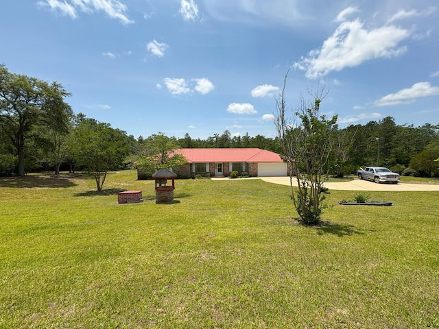 3864 Bear Head Rd, Crestview, FL 32539 - view of front of property with concrete driveway, a front yard, and a garage