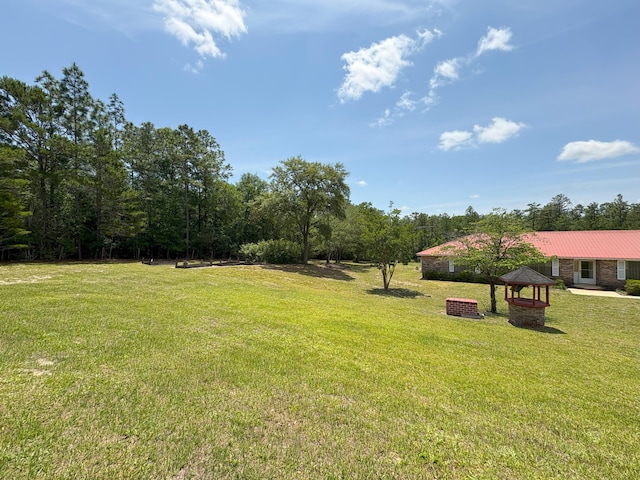 3864 Bear Head Rd, Crestview, FL 32539 - view of green lawn with a gazebo