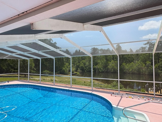 3864 Bear Head Rd, Crestview, FL 32539 - outdoor pool with a lanai, a water view, and a patio