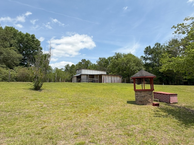 3864 Bear Head Rd, Crestview, FL 32539 - view of grassy yard with a gazebo and an outbuilding