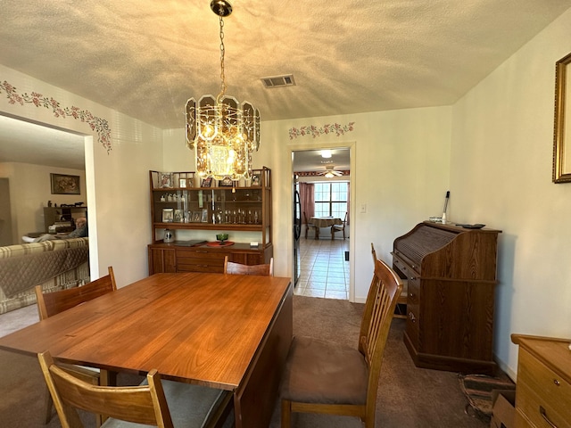 3864 Bear Head Rd, Crestview, FL 32539 - dining space with carpet floors, a chandelier, and a textured ceiling