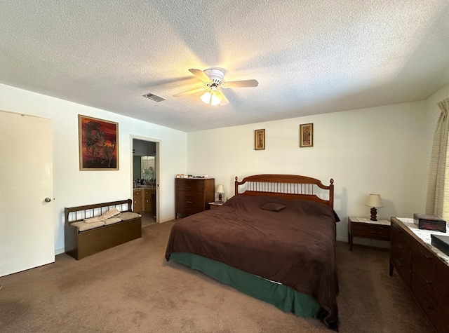 3864 Bear Head Rd, Crestview, FL 32539 - bedroom featuring carpet floors, a textured ceiling, ceiling fan, and ensuite bath