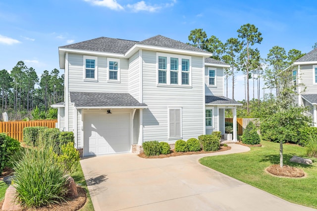 229 Windrow Way, Inlet Beach, FL 32461 - traditional-style house with roof with shingles, concrete driveway, and a garage
