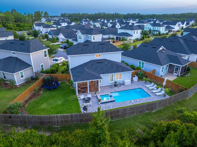 229 Windrow Way, Inlet Beach, FL 32461 - view of swimming pool featuring a residential view, a pool with connected hot tub, a trampoline, an outdoor hangout area, and a patio area