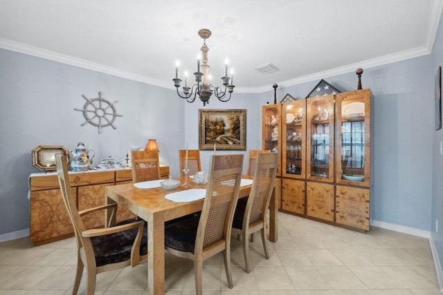 100 Kensington Cir, Panama City Beach, FL 32413 - dining room featuring a chandelier, crown molding, light tile patterned floors, and baseboards