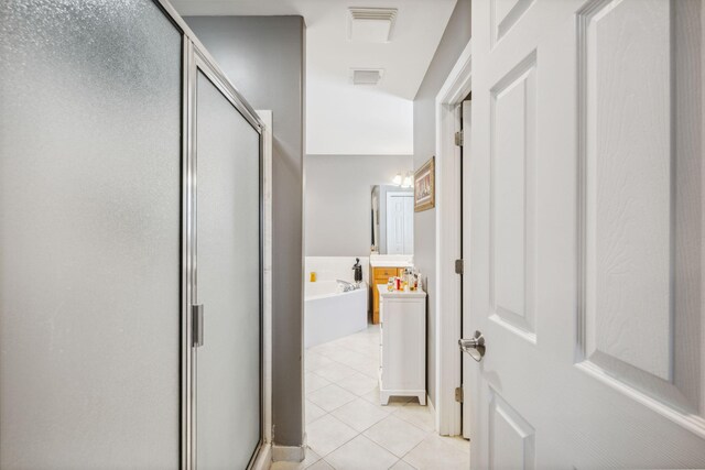 100 Kensington Cir, Panama City Beach, FL 32413 - corridor featuring light tile patterned floors