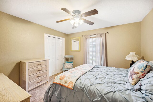 100 Kensington Cir, Panama City Beach, FL 32413 - bedroom with carpet flooring, a closet, and ceiling fan