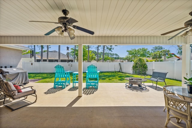 100 Kensington Cir, Panama City Beach, FL 32413 - view of patio / terrace with a fire pit, ceiling fan, and a grill