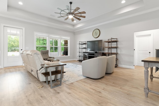 5362 Wyndell Cir, Crestview, FL 32539 - living room featuring a raised ceiling, light wood-style floors, baseboards, recessed lighting, and a ceiling fan