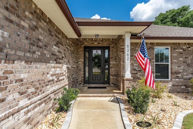 5362 Wyndell Cir, Crestview, FL 32539 - property entrance featuring brick siding and a shingled roof