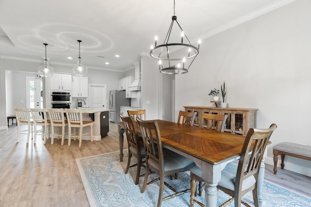 5362 Wyndell Cir, Crestview, FL 32539 - dining room featuring crown molding, light wood finished floors, a chandelier, recessed lighting, and baseboards