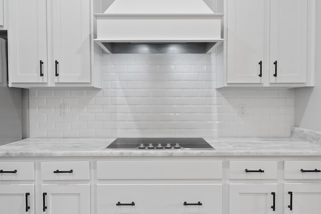 5362 Wyndell Cir, Crestview, FL 32539 - kitchen featuring custom range hood, black electric stovetop, white cabinetry, and decorative backsplash