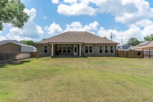 5362 Wyndell Cir, Crestview, FL 32539 - rear view of house with brick siding and roof with shingles