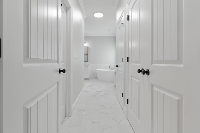 5362 Wyndell Cir, Crestview, FL 32539 - corridor featuring light marble finish flooring, crown molding, and baseboards