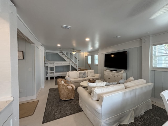 101 Barbados Dr, Cape San Blas, FL 32456 - living area with a decorative wall, healthy amount of natural light, stairway, and recessed lighting