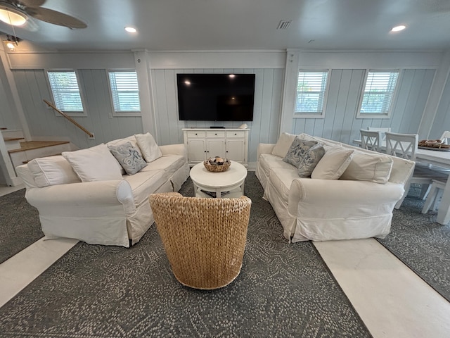 101 Barbados Dr, Cape San Blas, FL 32456 - living room with plenty of natural light, ceiling fan, stairway, recessed lighting, and a decorative wall