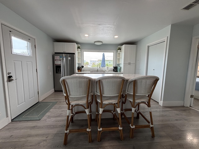 101 Barbados Dr, Cape San Blas, FL 32456 - dining room with recessed lighting, baseboards, and wood finished floors