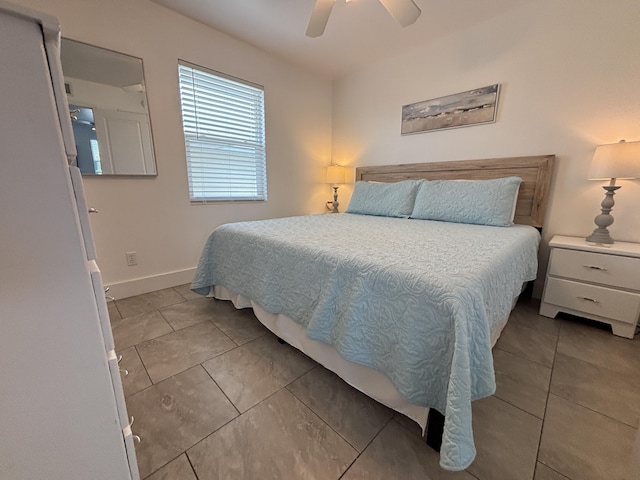 101 Barbados Dr, Cape San Blas, FL 32456 - tiled bedroom with baseboards and ceiling fan