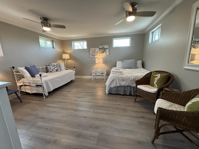 101 Barbados Dr, Cape San Blas, FL 32456 - bedroom featuring crown molding, wood finished floors, a ceiling fan, and baseboards